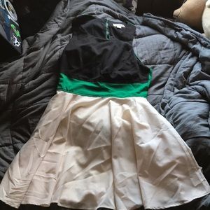 green, black and cream dress
